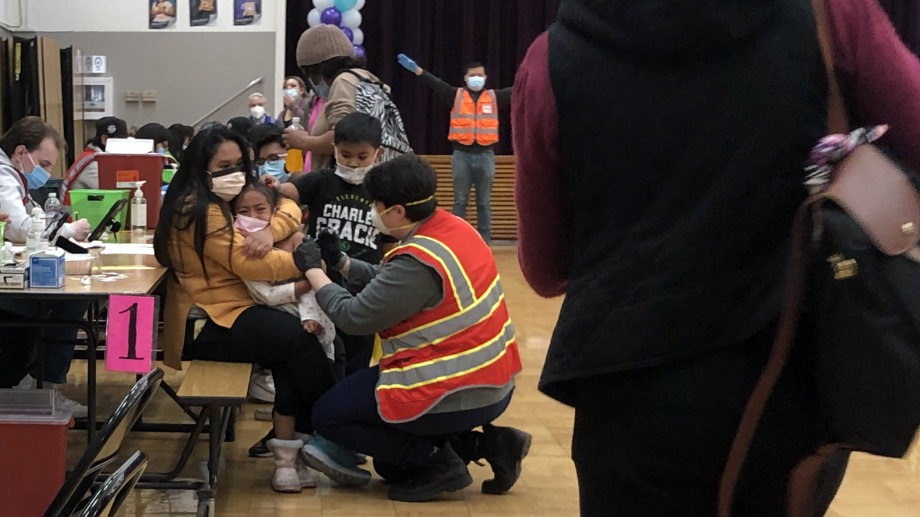 SSFUSD school nurse Kai Angelot administers COVID-19 vaccines during a vaccine clinic at Martin Elementary School.