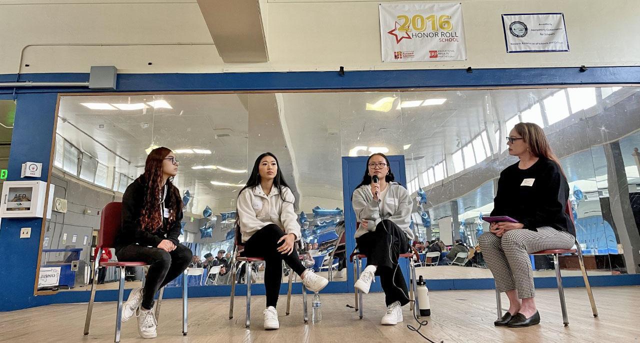Alta Loma Middle School teacher Kelly Duncan (r) moderates a panel discussion with (l to r) Baden High junior Donna Guerra and El Camino High junior Eza Vedar and sophomore Jamie Wong.