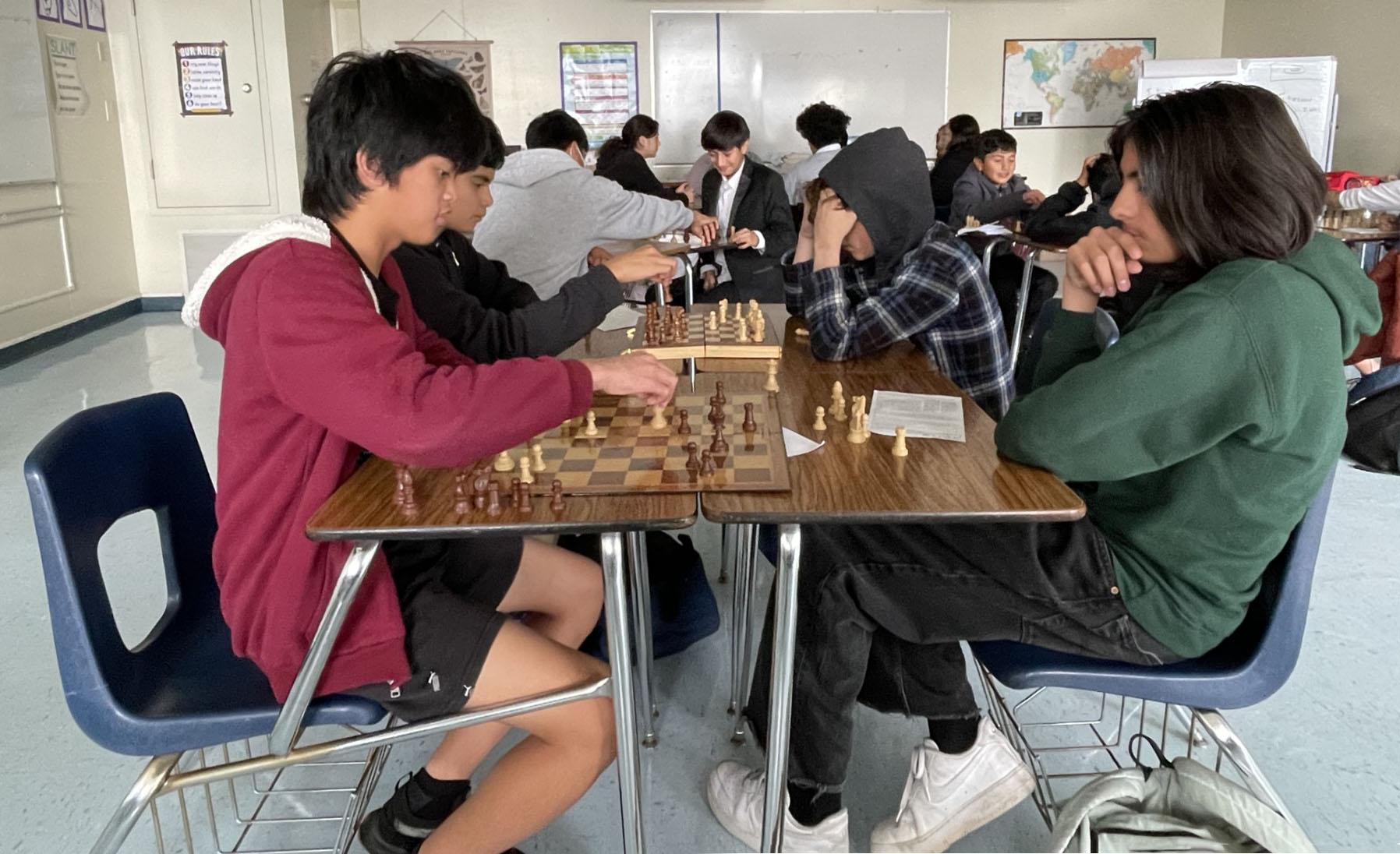 Parkway Heights Middle School students take part in chess class during the school's annual intercession event.